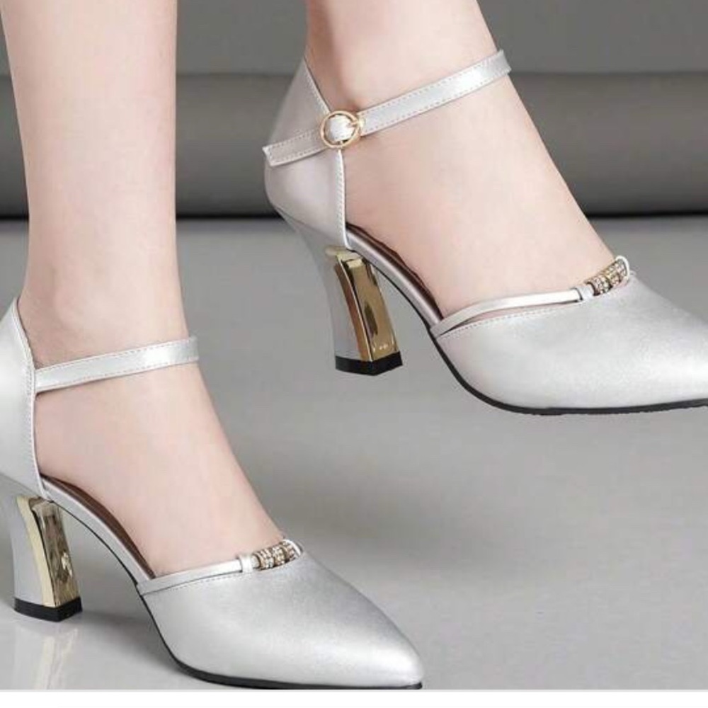Women silver color pumps with straps